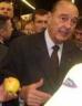 Chirac y manzana